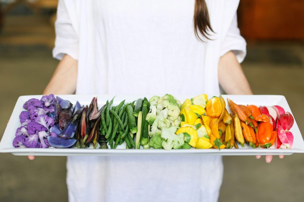 Urban Palate rainbow crudites platter carried to the table